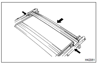 Toyota Corolla.  Install roof drip channel rear