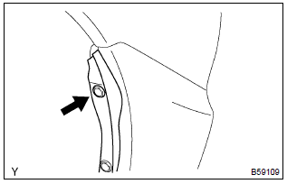 Toyota Corolla. Disconnect rear bumper side seal lh