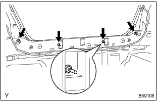 Toyota Corolla.  Remove rear bumper cover