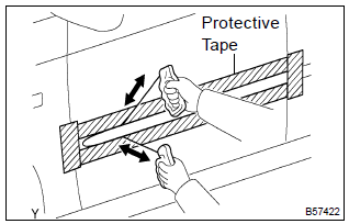 Toyota Corolla. Remove outside moulding