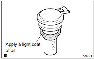 Toyota Corolla. Install fuel tank inlet valve assy