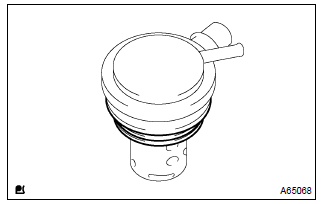 Toyota Corolla. Remove check valve gasket