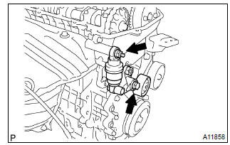 Toyota Corolla.  Remove v–ribbed belt tensioner assy