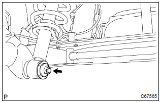 Toyota Corolla. Fully tighten rear shock absorber with coil spring