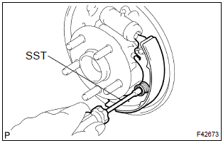 Toyota Corolla. Install rear brake shoe