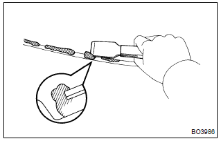 14. Clean back window glass